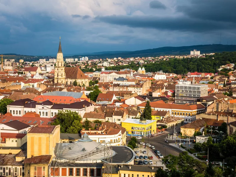 City skyline of Cluj in Transylvania, Romania, at dusk