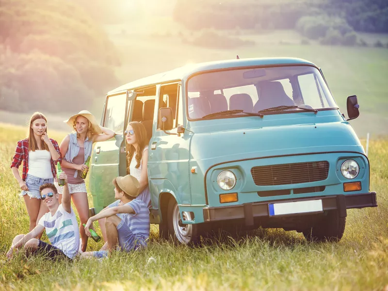 Young hipster friends on road trip