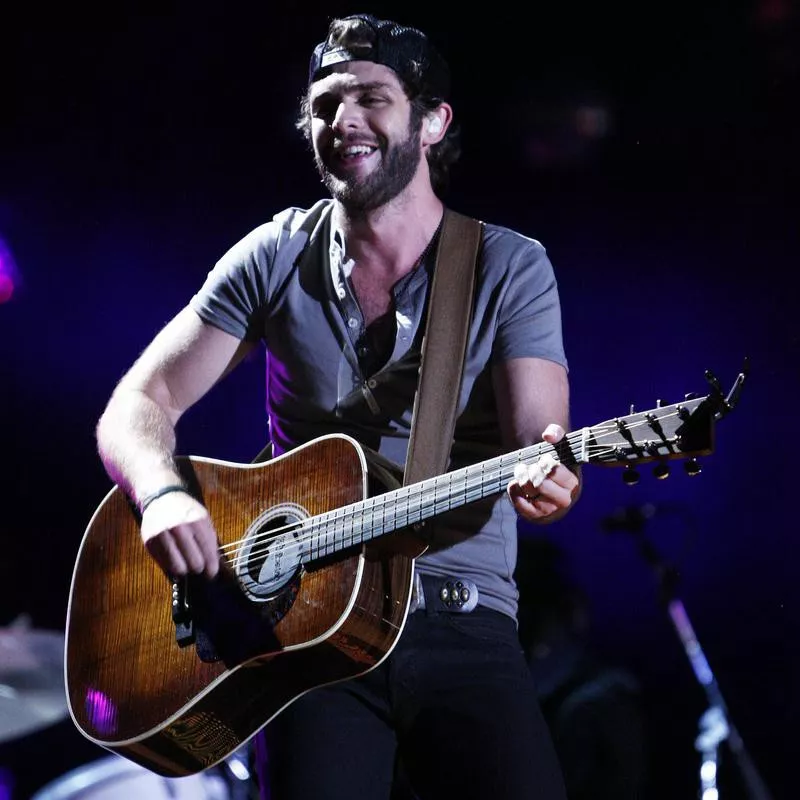 Thomas Rhett performing at CMA Fest