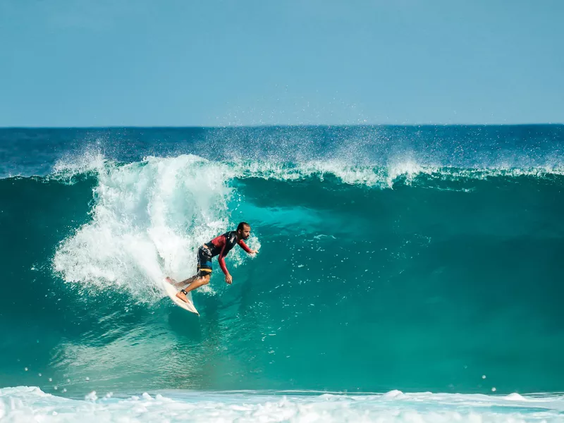 Man surfing wave in Brazil