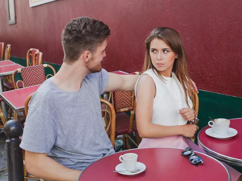 Couple fighting in cafe