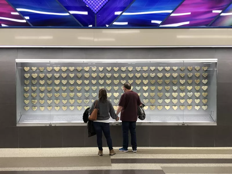 Couple enjoying art work at MSP Airport