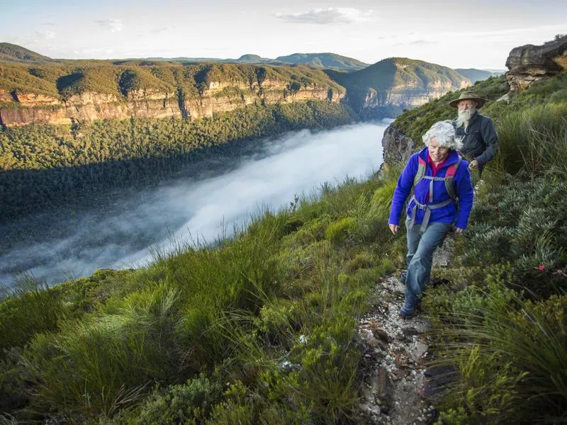 Elderly couple hiking in Australia