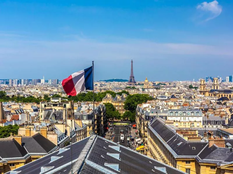 French flag with Eiffel Tower in the background