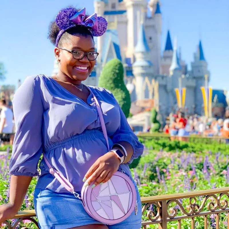 Girl with backpack in Disney