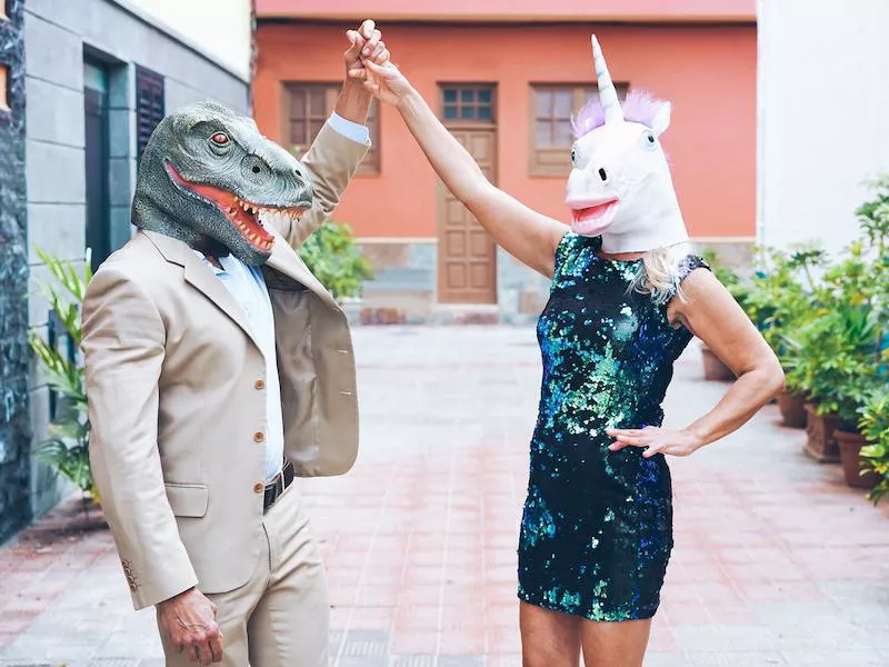 Couple wearing animal masks