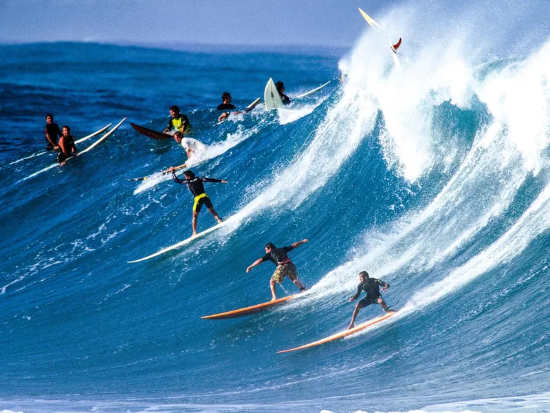 Surfing at Waimea Bay