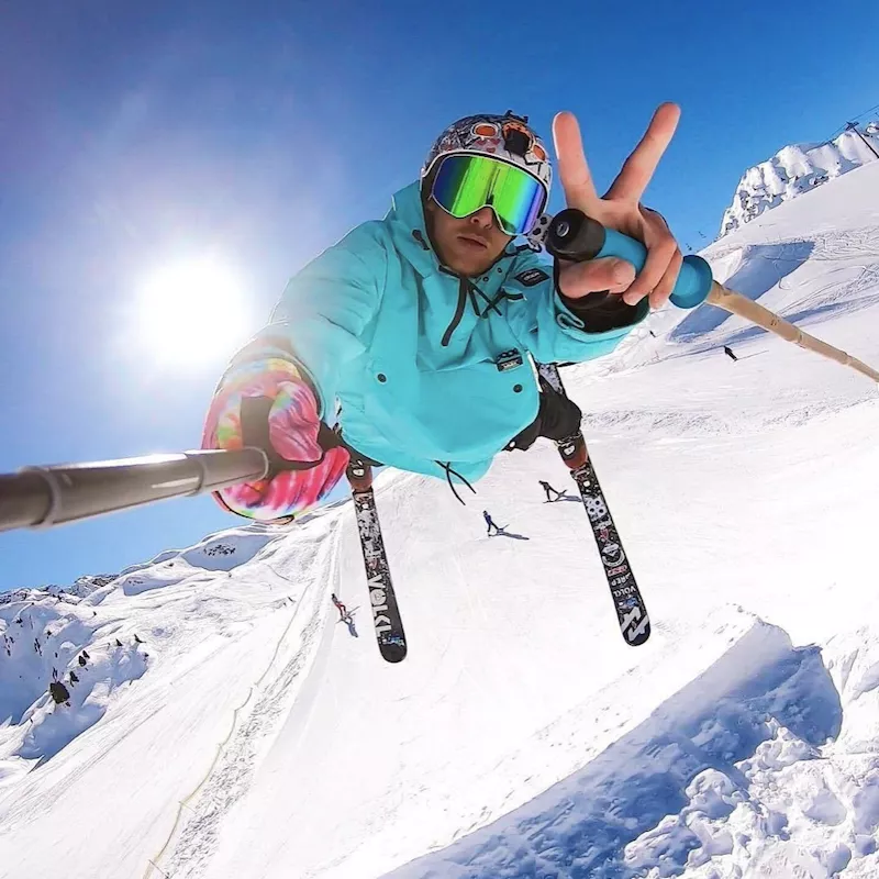 Mid-flight ski selfie