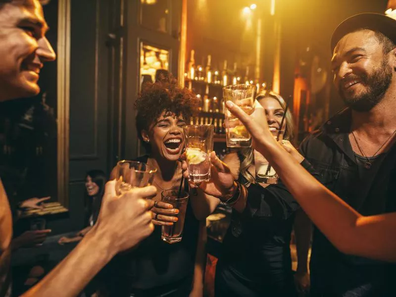 Travelers at a bar