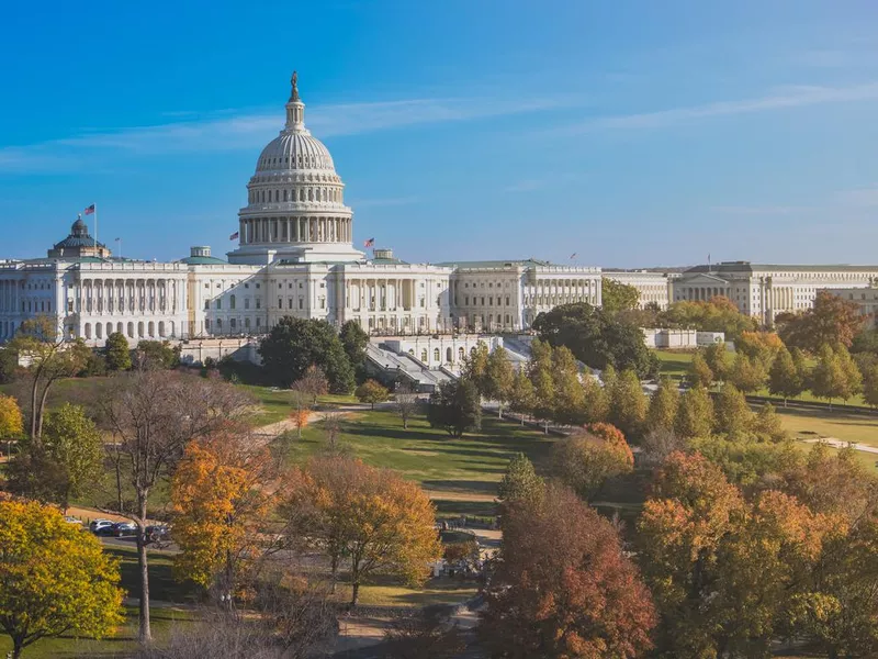 Front view of United States Capitol Hill in fall