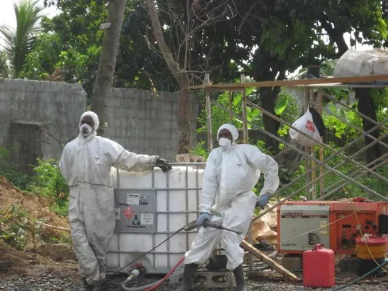 Men in hazmat suits in Dominican Republic