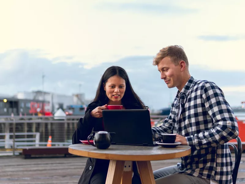 Casual business meeting at an outdoor cafe in Auckland, New Zealand