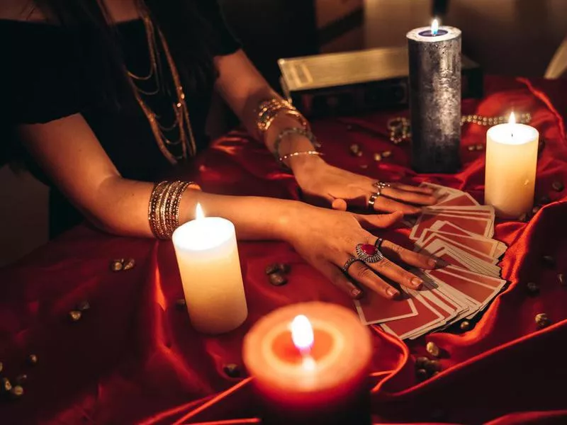 Fortune teller reading tarot