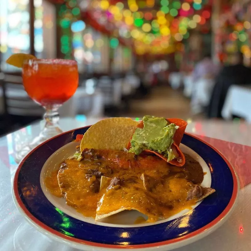 Bean and Cheese Nachos, Crispy Beef Taco, Cheese Enchilada and Guacamole