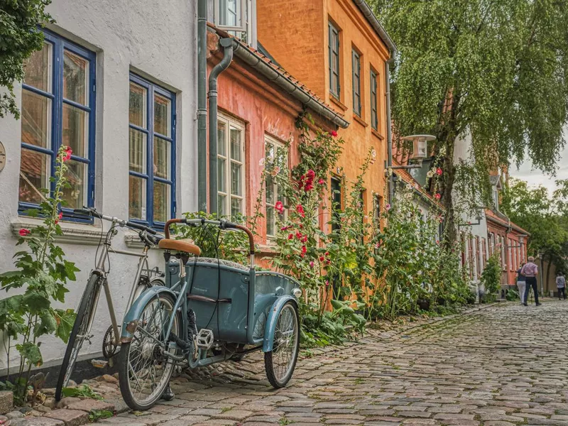 A typical Danish Cargo bike parked at the entrance of a house in Aarhus