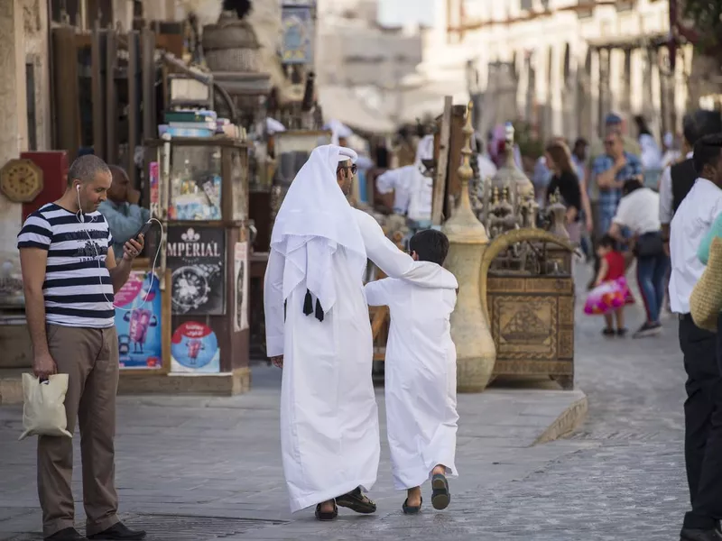 A Qatari family in traditional attire