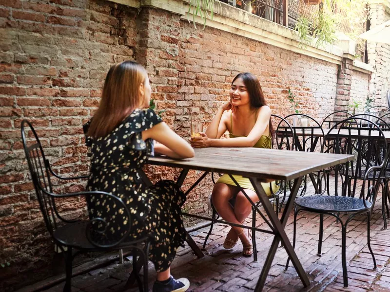 talking in outdoor cafe