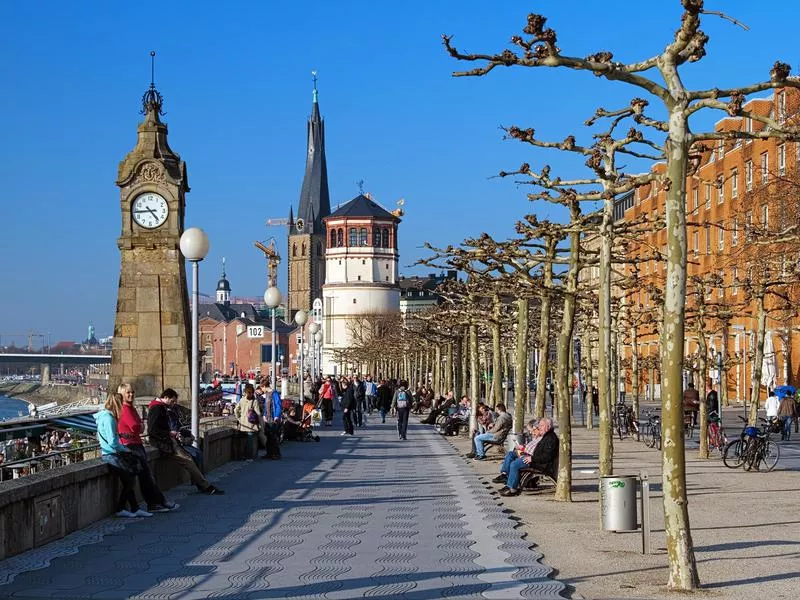 People on the Rhine embankment promenade in Dusseldorf