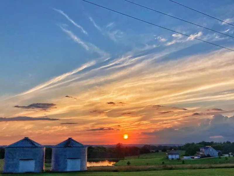 Sunset over houses in Versailles, Missouri