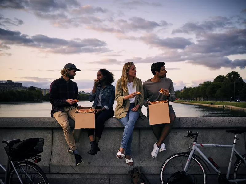 eating pizza and talking