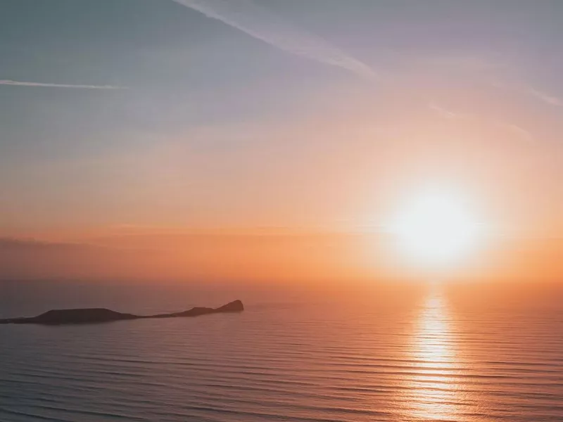 Sun over Rhossili Bay