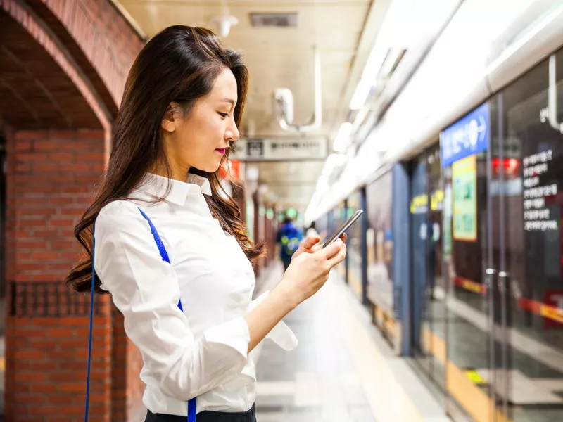 Young business woman in suwbay in Seoul