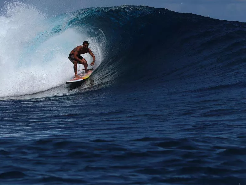 Teahupoo surfer