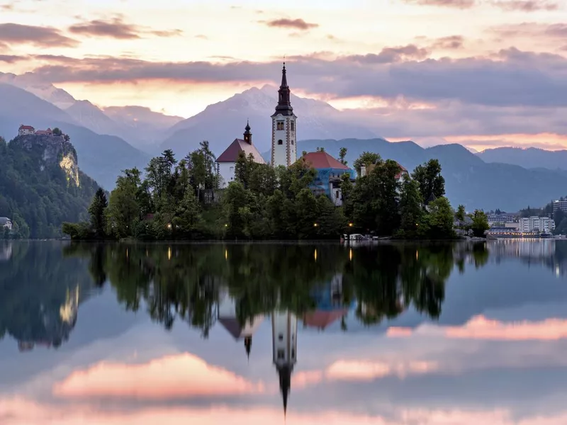 Church on lake Bled during sunrise