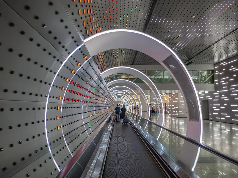 Escalator with light performance in baiyun internation airport guangzhou city china.Guangzhou Baiyun International Airport is the main airport of Guangzhou