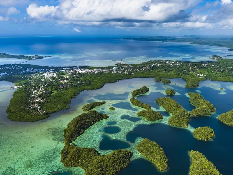 Streets of Palau Koror and coves of coral reefs