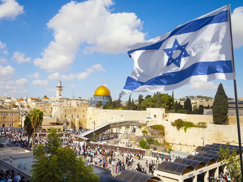 Jerusalem old city Western Wall with Israeli flag