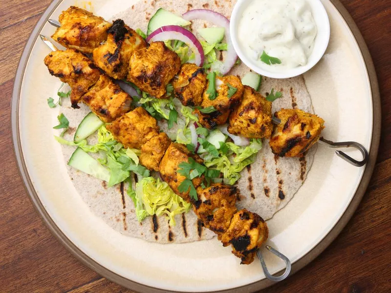 Two kebabs of Indian chicken tikka