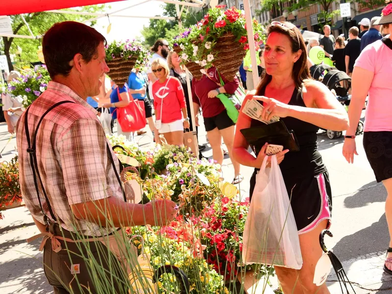 Buying produce at the Cedar Rapids Farmers Market