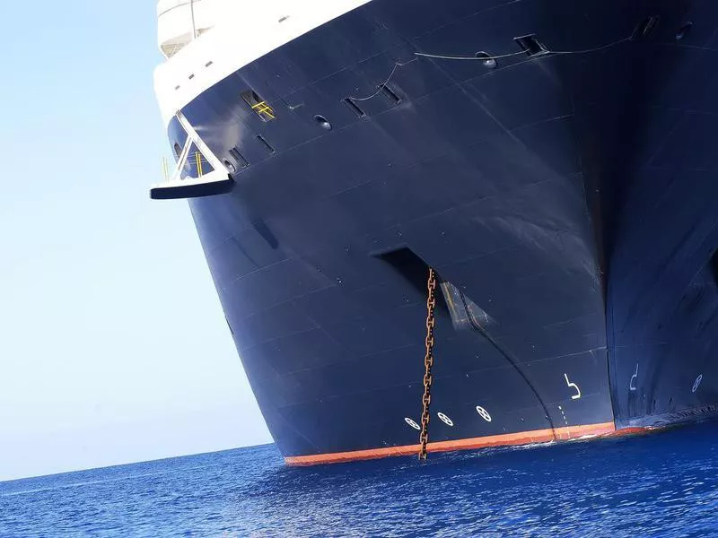 Cruise ship dropping anchor