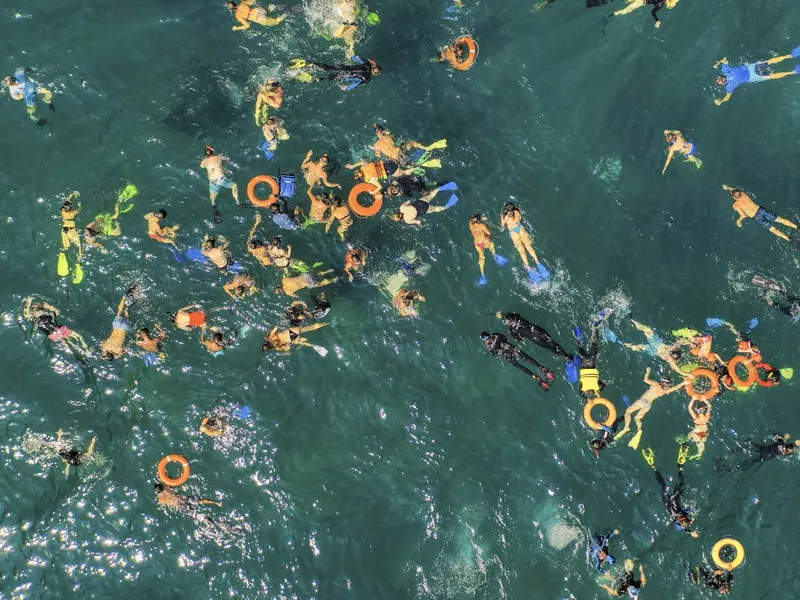 Bali tourists snorkeling