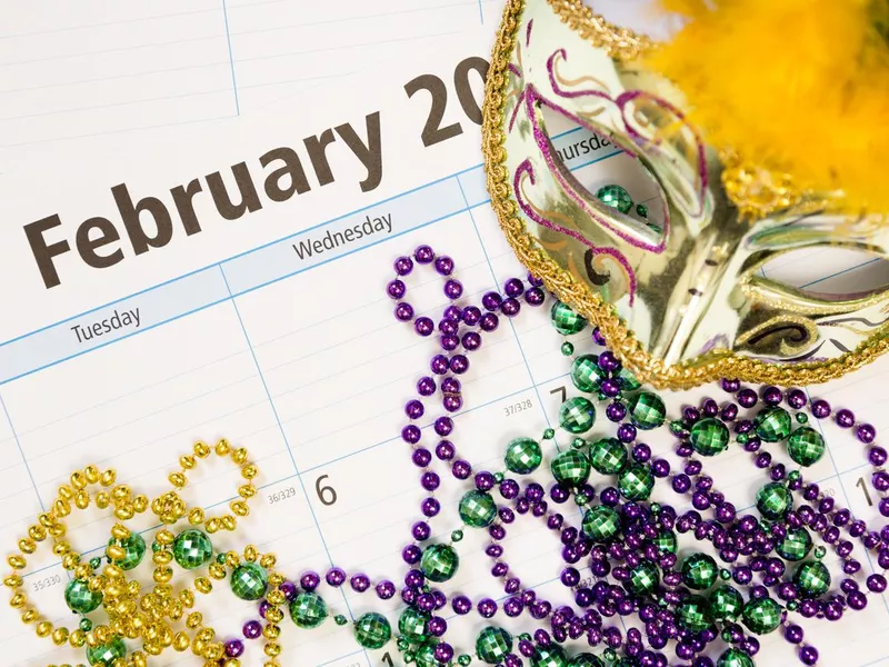 Holidays: February calendar with Mardi Gras decorations.