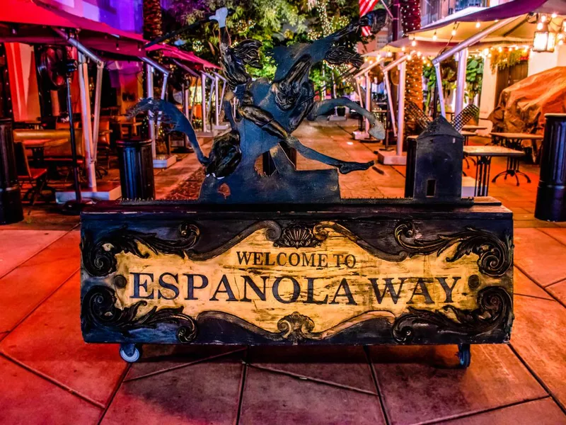 Espanola Way wood sign at night