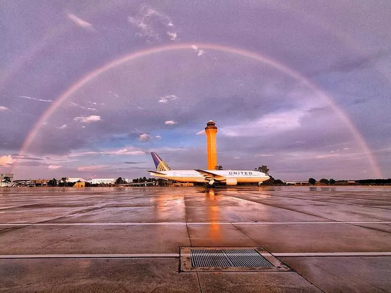 Rainbow over United Airlines aircraft