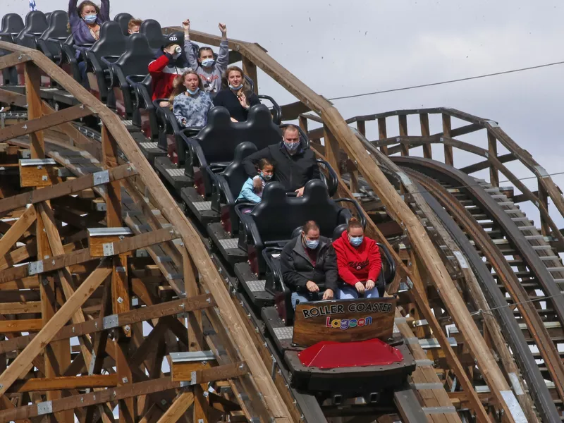 People ride the Roller Coaster