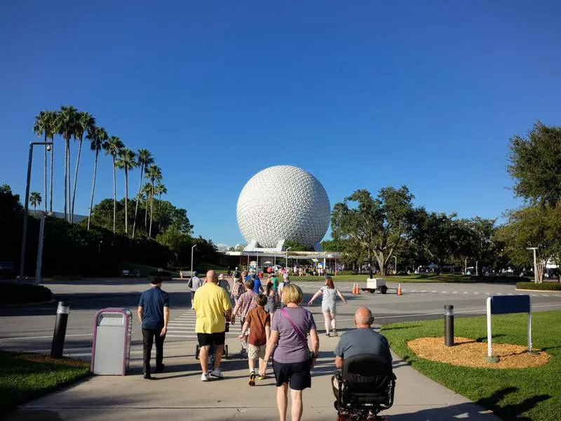 Tourists walking toward Epcot entrance