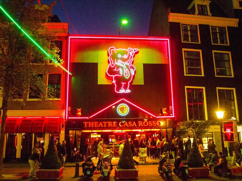 Many people at night at sexual entertainment theater Casa Rosso in Amsterdam