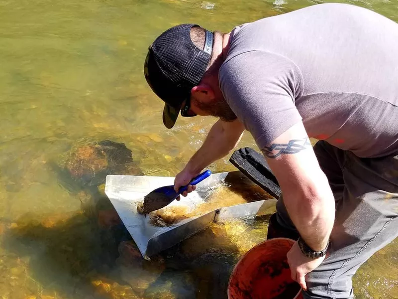 Panning for gold at Alabama gold Camp