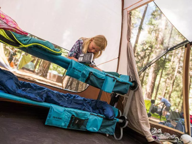 Disc-o-bed travel bunk cot