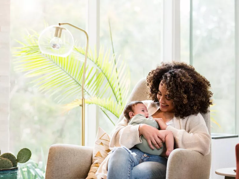 New mom spends quality time with baby boy