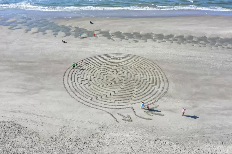 Maze in sand at Sunset Beach