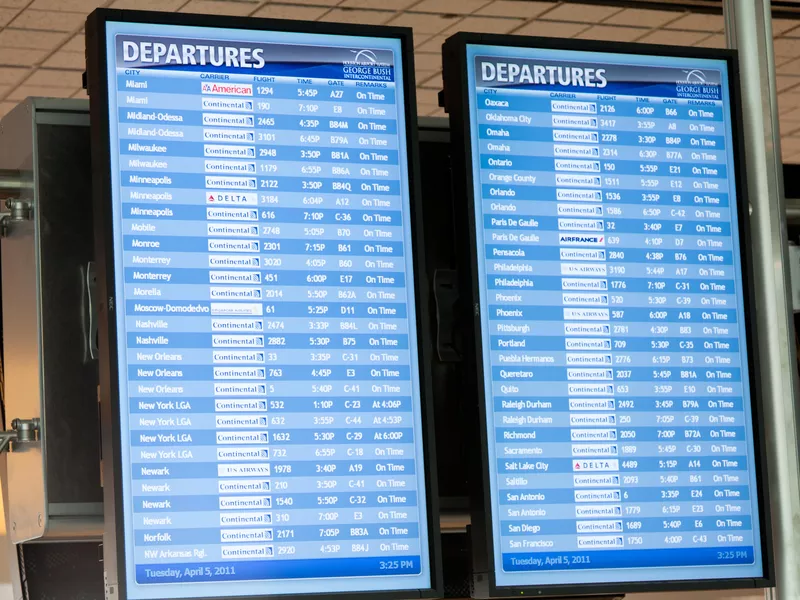 Departures screens at George Bush Intercontinental Airport in Houston, Texas