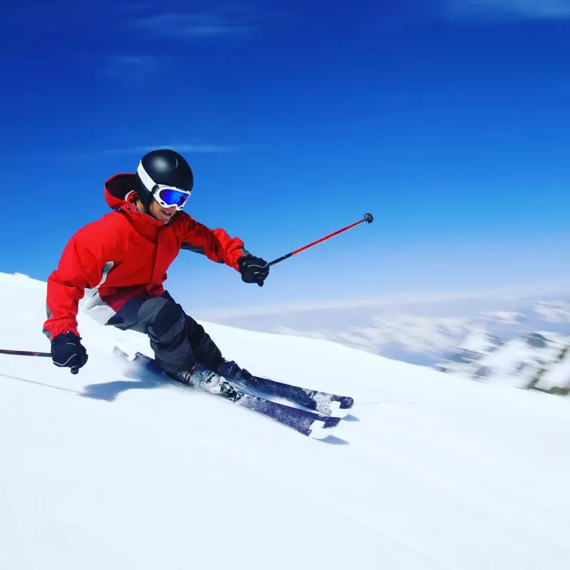 Person skiing on snowy mountain