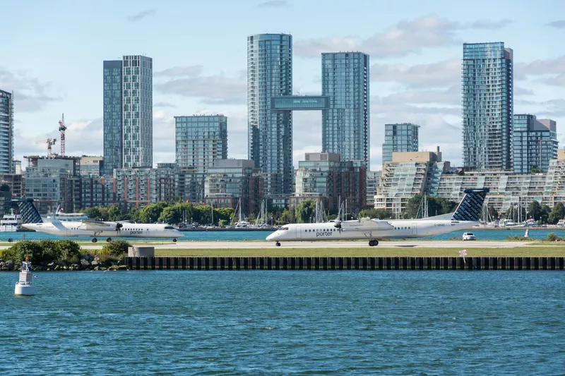 Two planes at Billy Bishop Toronto City Airport