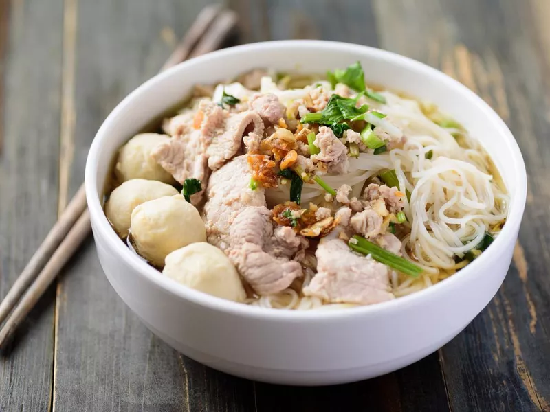 Thai rice noodles soup with pork and meat ball