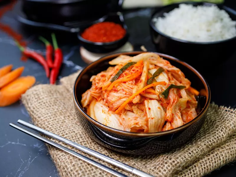 Eating kimchi cabbage and rice